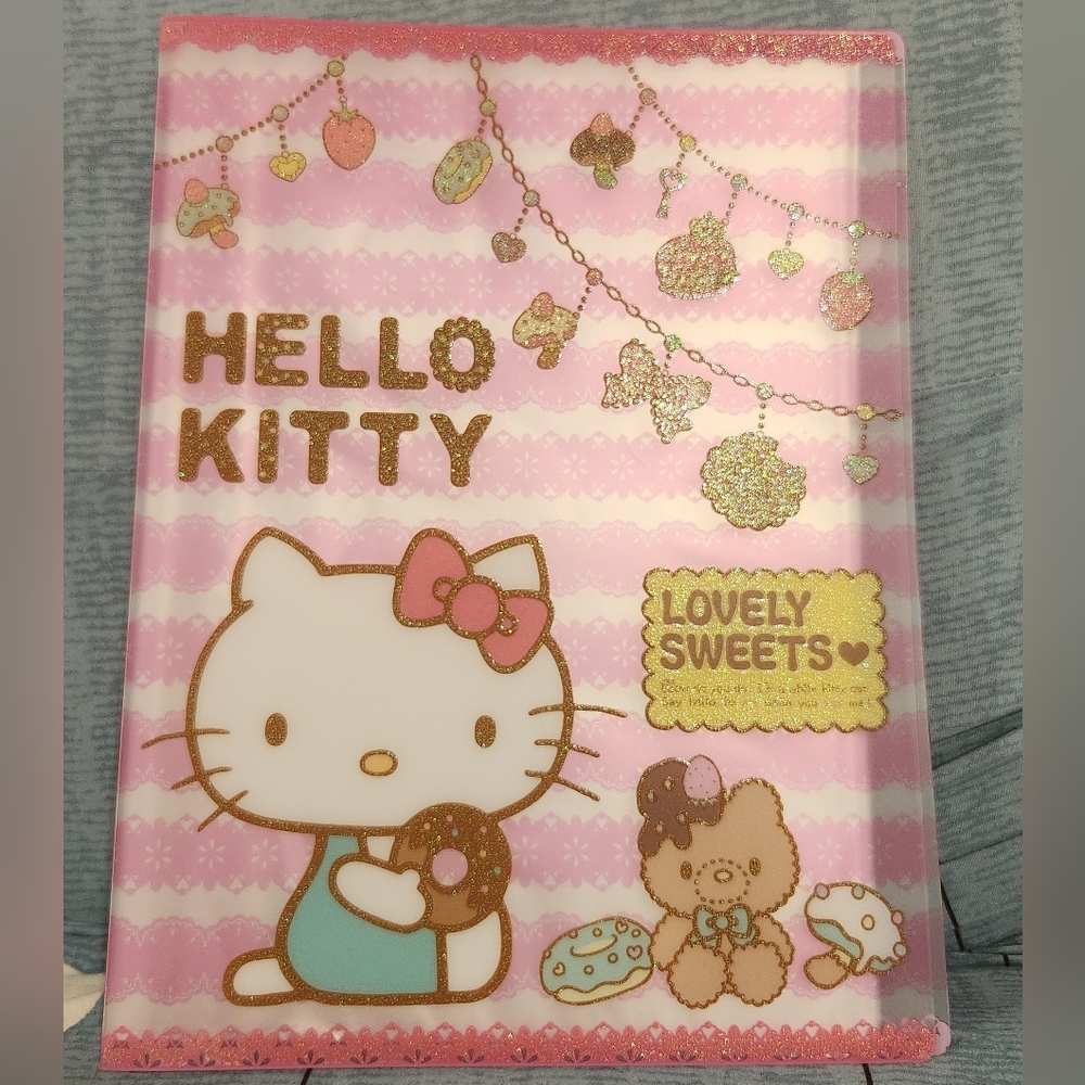 2/$20 Hello Kitty clear holder file